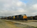 CSX 4708 leads a northbound intermodal train away from the station